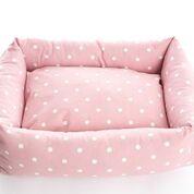 Dotty Rose Bolster bed features a cushion which is covered in a water-resistant fabric, drooling or wet paws will not be a problem.