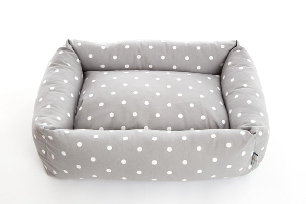 This quality bolster dog bed will bring luxurious comfort for your dog – and with its dotty smoke cover will be an elegant and stylish addition to your home.