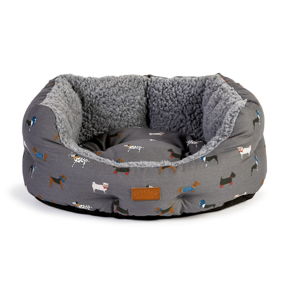 This FatFace Marching dogs bed has an extra-deep filling and quilted fibre shoulders providing maximum comfort. Come on in and take a look.